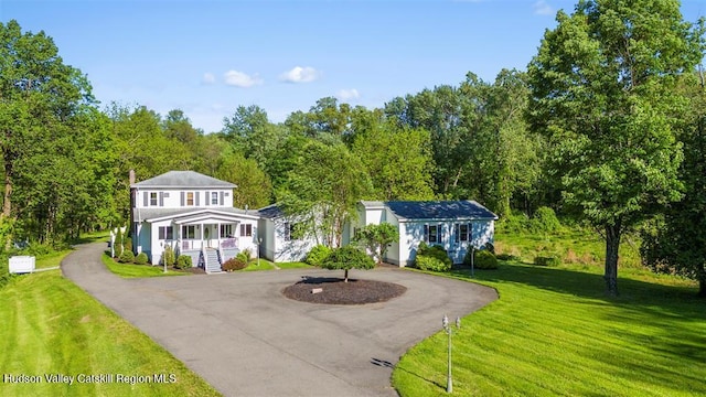 532 Springtown Rd, New Paltz, NY 12561 - view of front of home featuring curved driveway, a front lawn, and a porch