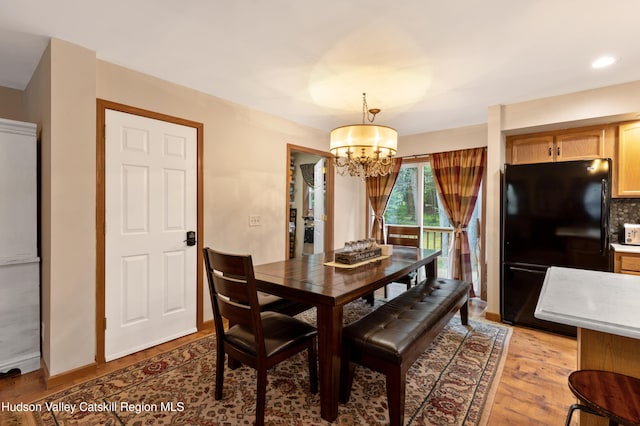 190 Deer Run Rd, Ashland, NY 12407 - dining space featuring a chandelier and light wood-style floors