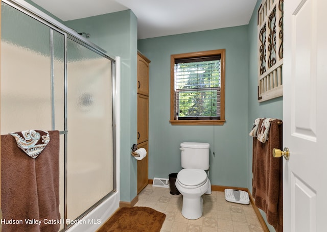 190 Deer Run Rd, Ashland, NY 12407 - bathroom featuring baseboards, a stall shower, and toilet