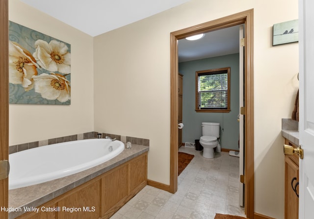190 Deer Run Rd, Ashland, NY 12407 - full bathroom featuring a bath, baseboards, and toilet