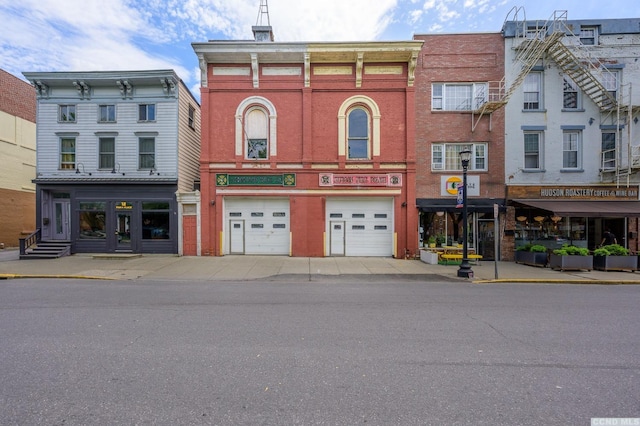 8-10 Park Pl, Hudson, NY 12534 - townhome / multi-family property with a garage