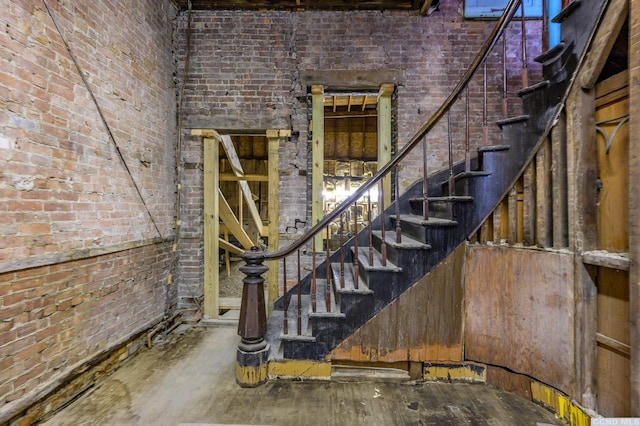 8-10 Park Pl, Hudson, NY 12534 - below grade area featuring brick wall and stairway