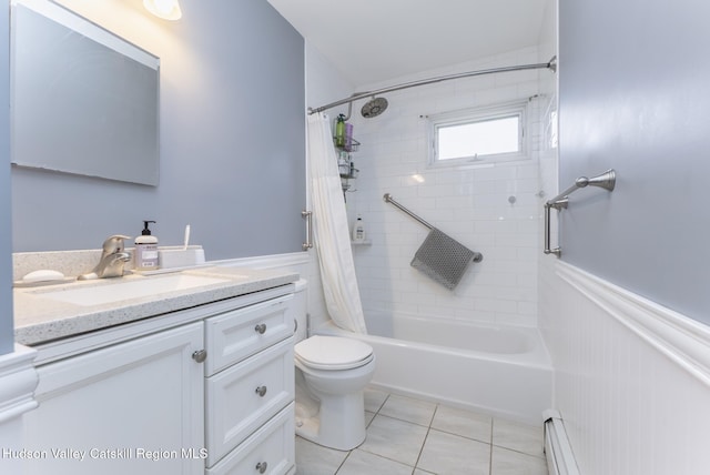 121 Rayna St, Hurley, NY 12443 - bathroom with tile patterned flooring, wainscoting, vanity, toilet, and shower / bath combo with shower curtain