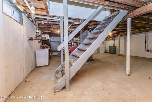 121 Rayna St, Hurley, NY 12443 - unfinished basement featuring stairway and washer / clothes dryer