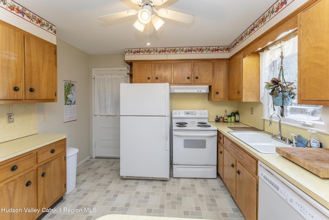 121 Rayna St, Hurley, NY 12443 - kitchen featuring white appliances, a sink, under cabinet range hood, light countertops, and a ceiling fan