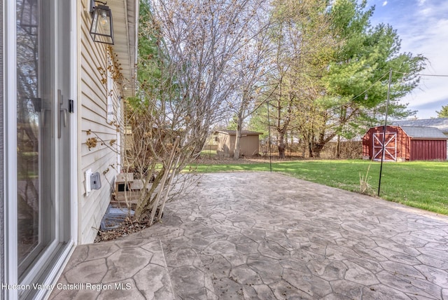 121 Rayna St, Hurley, NY 12443 - view of patio with a shed and an outdoor structure