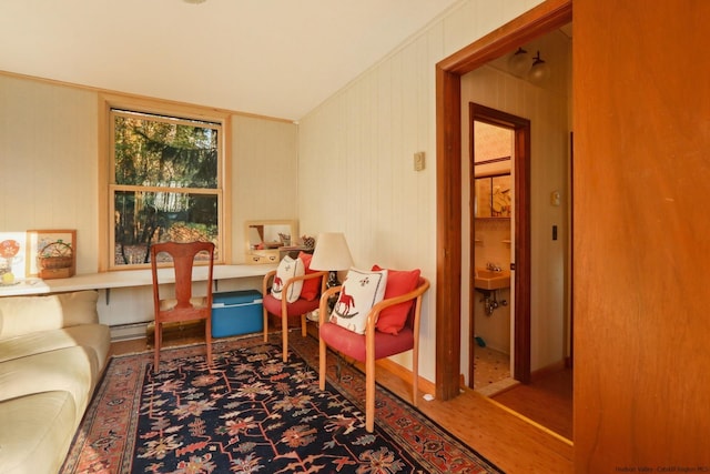 sitting room featuring crown molding