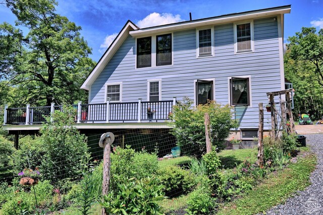 630 County Route 11, Ancram, NY 12502 - back of property with a wooden deck
