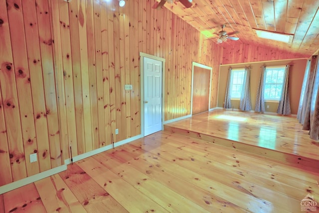630 County Route 11, Ancram, NY 12502 - empty room with vaulted ceiling, wooden walls, ceiling fan, wooden ceiling, and hardwood / wood-style floors