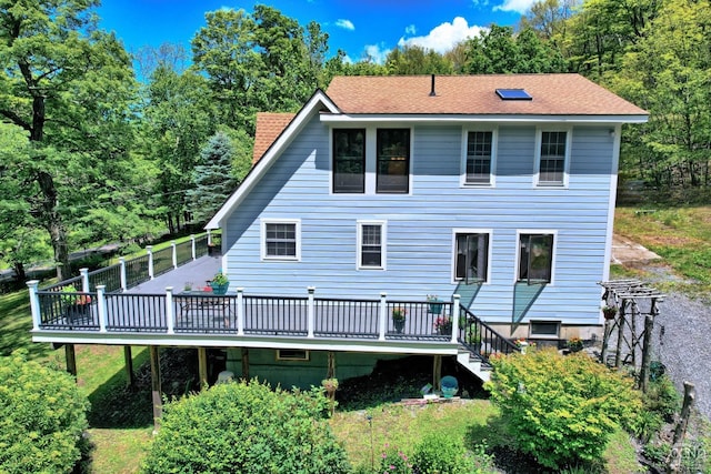 630 County Route 11, Ancram, NY 12502 - rear view of house featuring a wooden deck and a chimney
