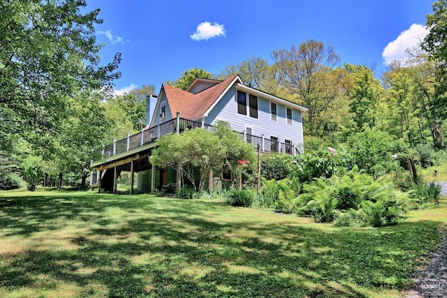 630 County Route 11, Ancram, NY 12502 - view of front of home featuring a front yard, a deck, and a chimney
