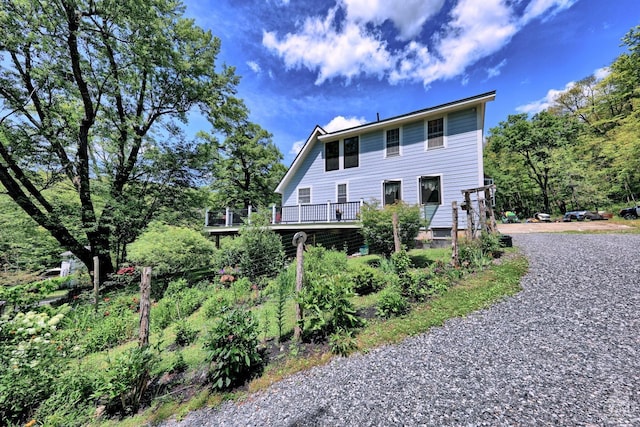 630 County Route 11, Ancram, NY 12502 - view of front facade featuring driveway and a deck