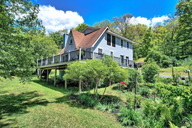 630 County Route 11, Ancram, NY 12502 - rear view of house with a yard, a wooden deck, and a chimney