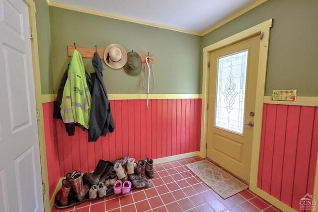 630 County Route 11, Ancram, NY 12502 - foyer with a wainscoted wall, crown molding, and tile patterned flooring