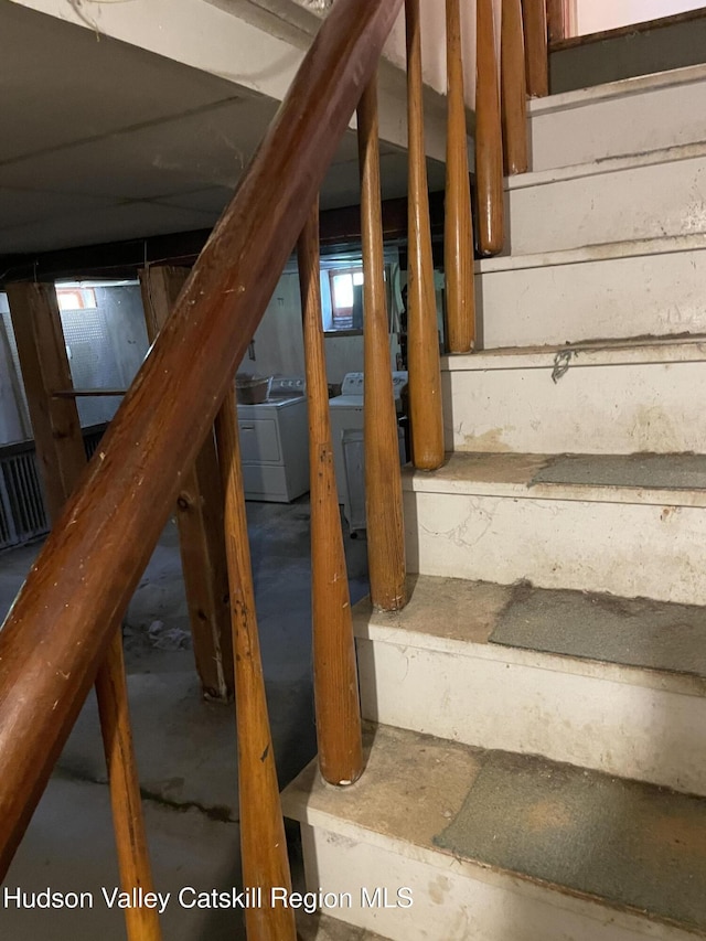 12 Fabiano Blvd, Hudson, NY 12534 - stairs featuring washer and dryer and unfinished concrete flooring
