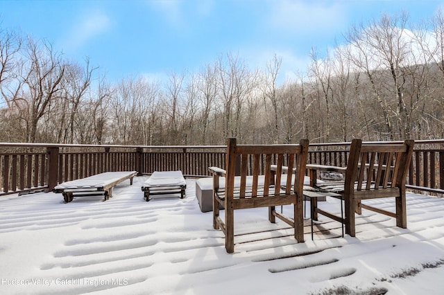 view of snow covered deck