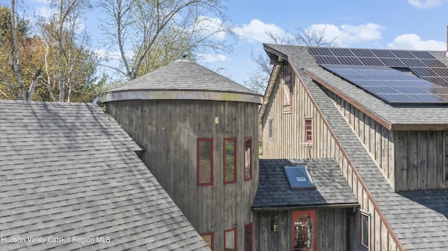 455 Post Hill Rd, Craryville, NY 12534 - view of side of property with roof mounted solar panels and a shingled roof