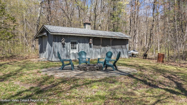 455 Post Hill Rd, Craryville, NY 12534 - view of outbuilding featuring a view of trees and an outdoor fire pit