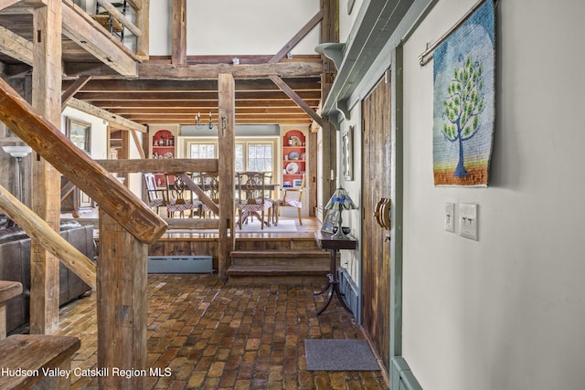 455 Post Hill Rd, Craryville, NY 12534 - hallway with brick flooring and a baseboard heating unit