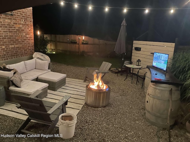 797 State Route 203, Spencertown, NY 12165 - patio at night featuring an outdoor living space with a fire pit