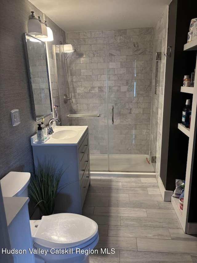 797 State Route 203, Spencertown, NY 12165 - full bath featuring vanity, a shower stall, and wood finish floors