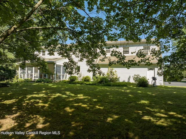 17 Stephen Dr, Hudson, NY 12534 - view of front of property with a sunroom and a front yard