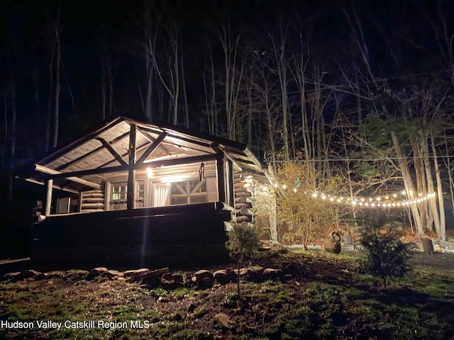 view of property exterior at twilight