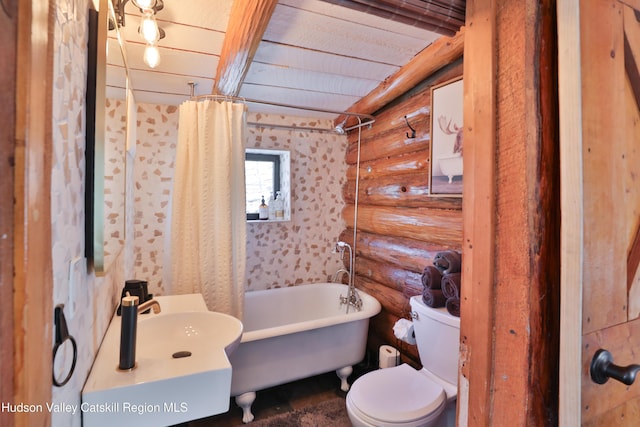 bathroom with toilet and rustic walls