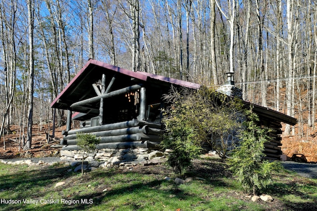 view of log-style house