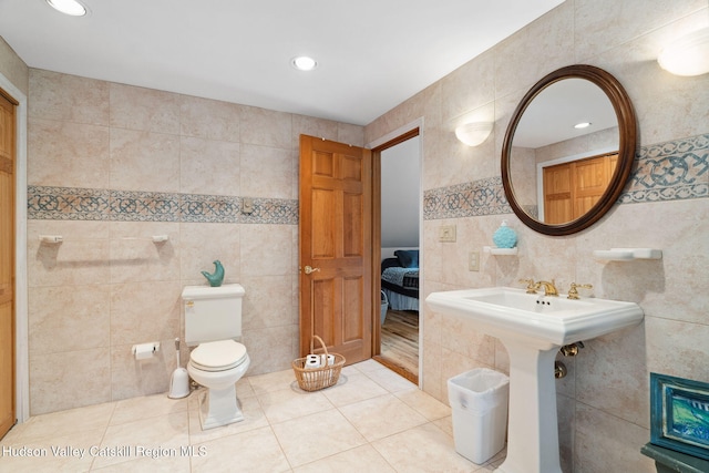552 Bearkill Rd, Gilboa, NY 12076 - bathroom featuring tile walls, tile patterned flooring, and recessed lighting