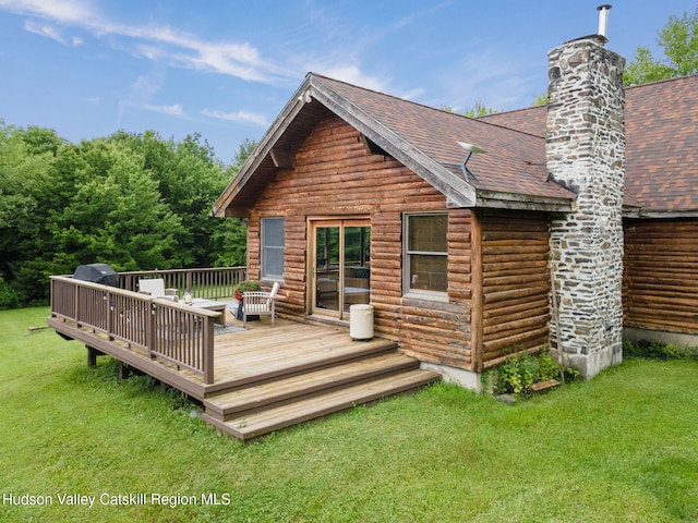 552 Bearkill Rd, Gilboa, NY 12076 - back of property with a shingled roof, a yard, a wooden deck, and a chimney