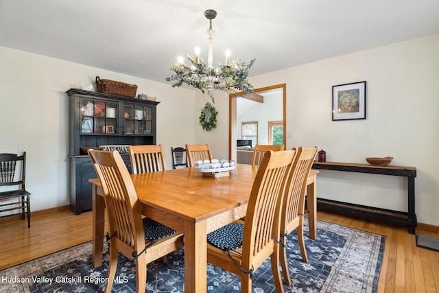 552 Bearkill Rd, Gilboa, NY 12076 - dining space featuring a chandelier and hardwood / wood-style floors