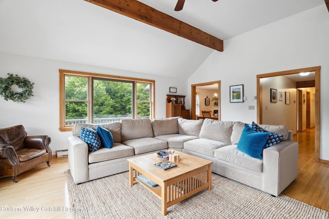 552 Bearkill Rd, Gilboa, NY 12076 - living room with a baseboard heating unit, light wood-style floors, and ceiling fan