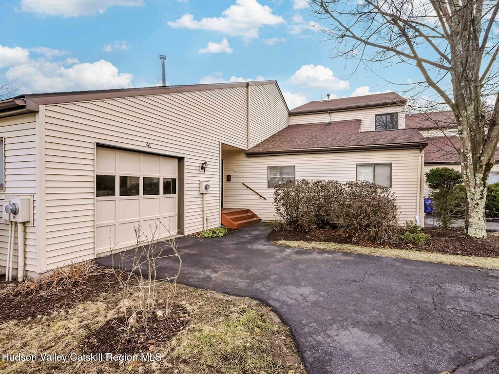 view of front of home with a garage