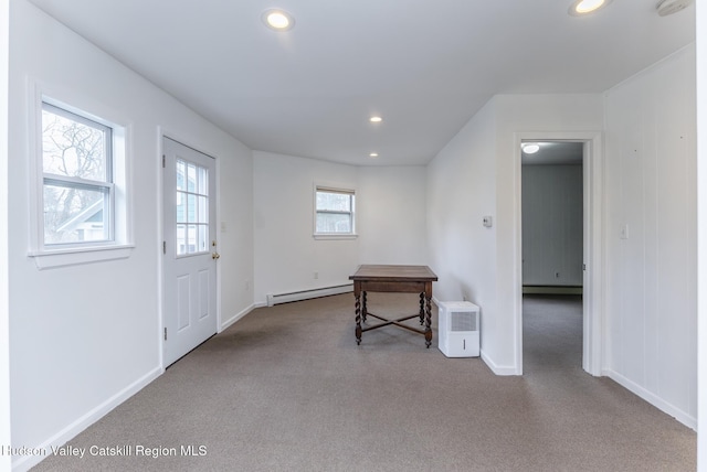 foyer entrance featuring a baseboard heating unit, recessed lighting, carpet floors, and a baseboard radiator