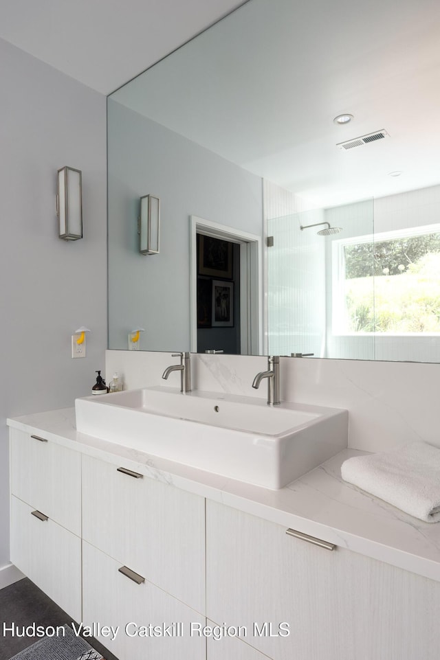 64 Dug Rd, Accord, NY 12404 - bathroom with vanity and a shower