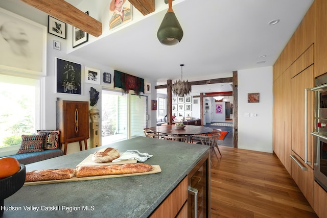 64 Dug Rd, Accord, NY 12404 - kitchen with beverage cooler, a chandelier, plenty of natural light, and wood finished floors