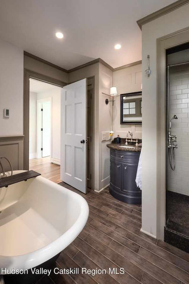 64 Dug Rd, Accord, NY 12404 - full bath with vanity, tiled shower, wood finished floors, recessed lighting, and crown molding