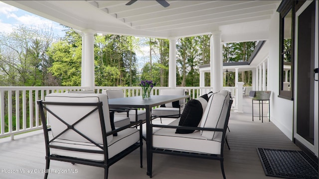 wooden deck with ceiling fan