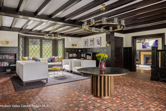 living room with beam ceiling