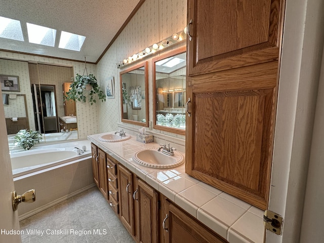 50 County Rte 26, Coxsackie, NY 12192 - bathroom with a skylight, wallpapered walls, double vanity, a garden tub, and crown molding