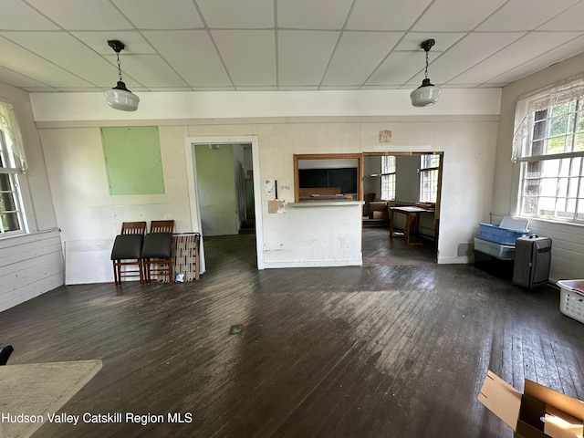 50 County Rte 26, Coxsackie, NY 12192 - living area featuring dark wood-style flooring and a paneled ceiling