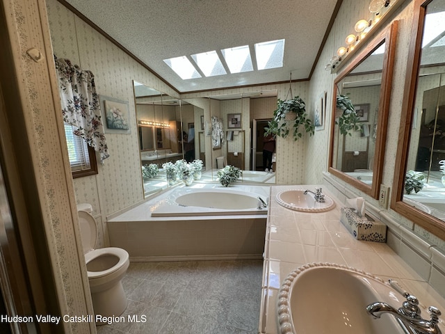 50 County Rte 26, Coxsackie, NY 12192 - bathroom with wallpapered walls, a skylight, crown molding, toilet, and double vanity