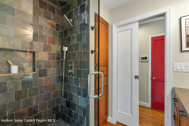 162 Methodist Farm Rd, Averill Park, NY 12018 - bathroom featuring a stall shower, vanity, and wood finished floors