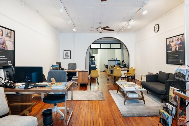526-528 Warren St, Hudson, NY 12534 - office space featuring track lighting, arched walkways, a ceiling fan, and hardwood / wood-style flooring