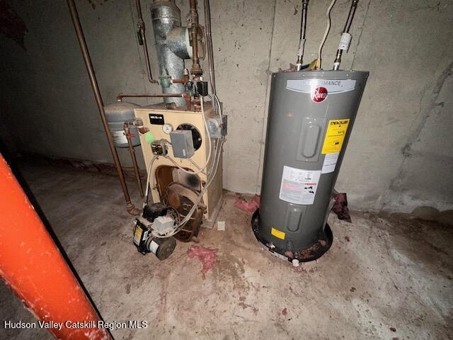 utility room with electric water heater