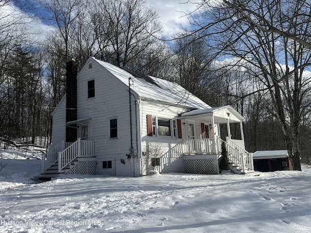 view of front of house with a chimney