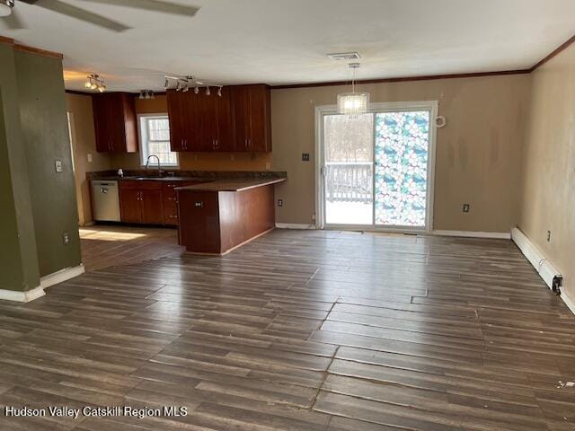 kitchen featuring pendant lighting, sink, ceiling fan, dark hardwood / wood-style floors, and baseboard heating