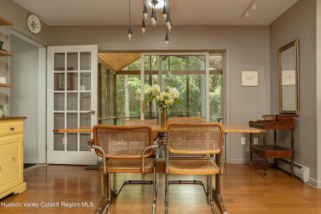 70 Reardon York Ests, Canaan, NY 12029 - dining room with wood finished floors and a baseboard heating unit