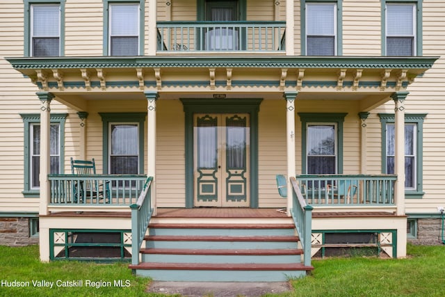 279 Maybie Rd, Gilboa, NY 12076 - property entrance with a porch and a balcony